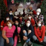 Jr Vets pose with Santa & wear masks to protect from the Thomas Fire smoke. Many of these youth & others would aid Genete in the months ahead working with displaced animals.