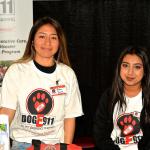 Jr Vets Yadira Solano & Lesly Diaz run the DogE911 booth while Genete teaches a seminar. 