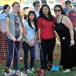 Genete & DogE911 Jr Vets pose during a pet event. 