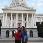 Christina (holding book) & Genete in front of the State Capitol in Sacramento, CA. (Feb. 2009) 
