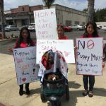 DogE911 youth & Liesel (a puppy mill survivor) protest to end the cruel practice of Puppy Mills. 